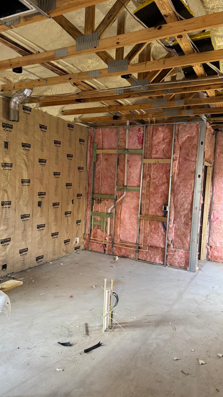 Interior framing with roof trusses, thermal insulation and utilities